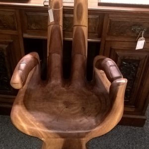Wooden chair in a shape of hand